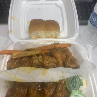 Honey gold and spicy seasoned wings with fried okra. Amazing!