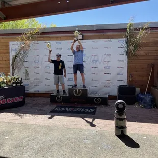 Trophy presentation in front of the trackside store