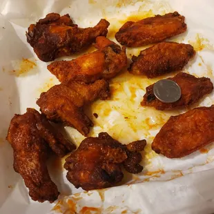 chicken wings in a paper bag