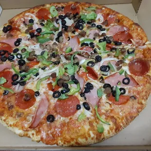 A large supreme pizza $12.99 with your choice of cheesy bread or potato wedges I love this place