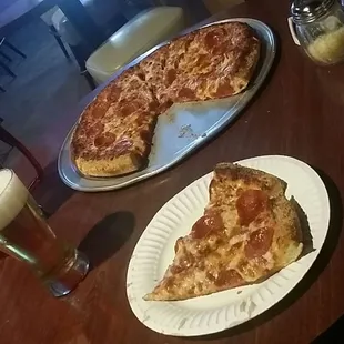 A pitcher of beer and a large, one-topping pizza for $16?!? You can't find a better deal anywhere else!