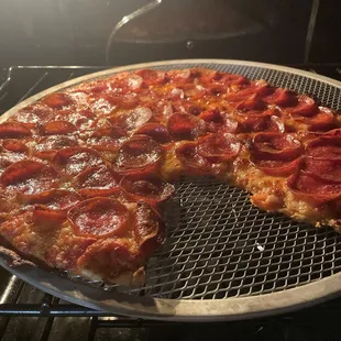 The uncooked pizza in my oven now.