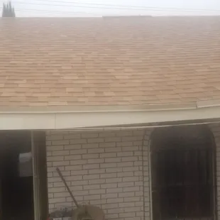 Roof with new shingles, but unrepaired structural damage.