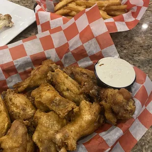 Dry rub Wings and fries.  Lesssgggooooo!