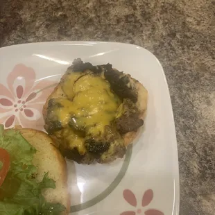 Burger scraps covered in cheese