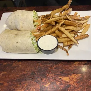 Crispy (ranch) chicken wrap with fries.