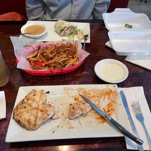 Blackened chicken dinner, fresh cut fries, Caesar chicken wrap.