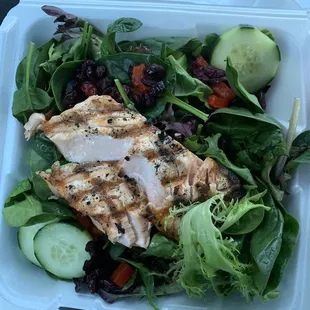 Salmon salad   Salmon cucumbers red pepper spinach arugula raisins