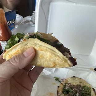 Side view of birria taco folded up