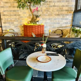 a table and chairs in a restaurant