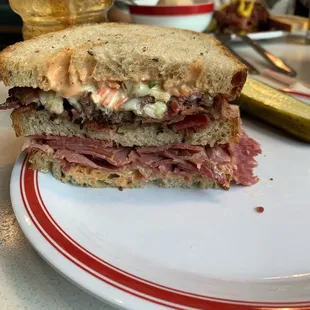 Pastrami, corned beef, cole slaw, and Russian dressing.  Fantastic!!