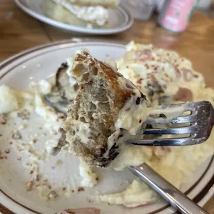 Creamed eggs over toast