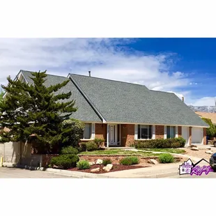 Completed roof install. Roofers did a great job working this 10/12 pitched slope!