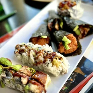 S9. Eel Sushi H3. Spicy Tuna Roll B6. Baked Langostino Roll