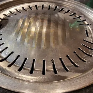 the inside of a stainless steel strainer