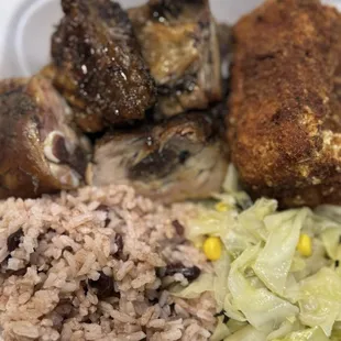 Jerk Chicken, Cabbage, Fried Mac N Cheese, Black beans and Rice