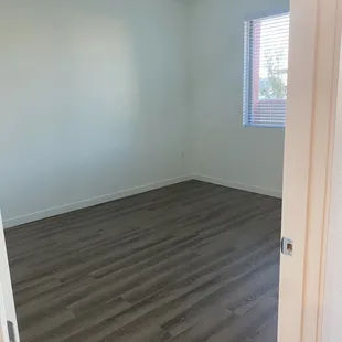 One of the two bedrooms - love the flooring!