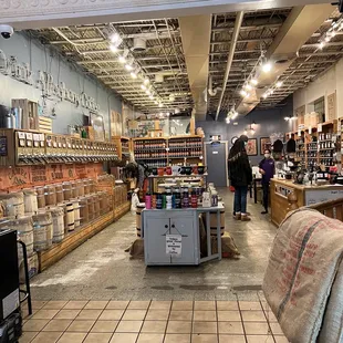 Back of store, fresh coffee and mugs