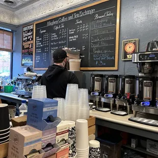 a bari serving coffee