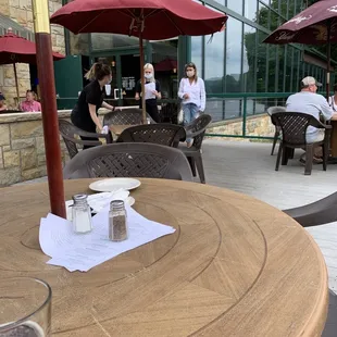 Servers coming out of the kitchen with masks at their chin or below nose.. The rules aren't effective if not enforced by management!