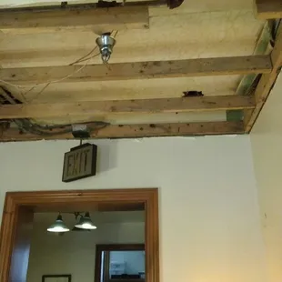 Yes. Upgrades necessary. This is just off foyer, above the (unisex) restroom.