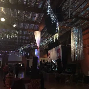 Live band playing while people dancing salsa.