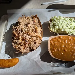 BBQ, coleslaw, baked beans and the single hushpuppy