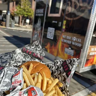 a basket of fries and a burger