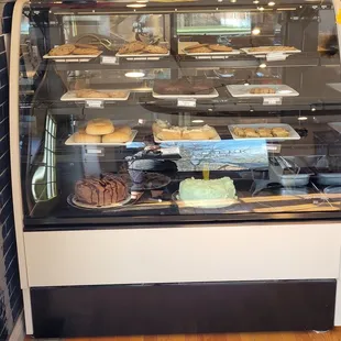 a display of cakes and pastries