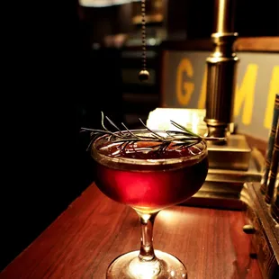a cocktail in a coupe glass