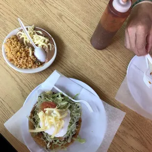 Al Pastor tostada with a side of rice and beans -- the perfect amount of food!