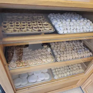 a display case full of baked goods