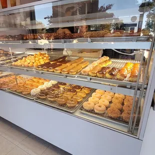 a display case full of donuts