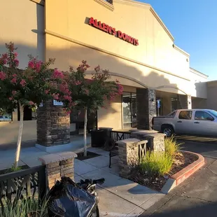 a no parking sign in front of the building