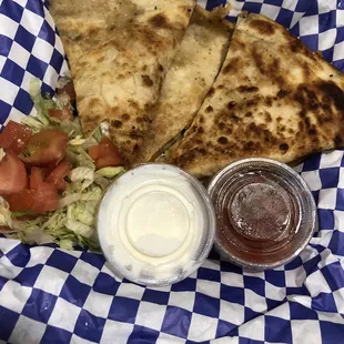 Chickens quesadilla. Come with sour cream and delicious fresh salsa.