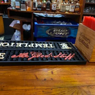 a bar with a wooden bar top