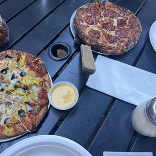 Veggie pizza and pepperoni pizza