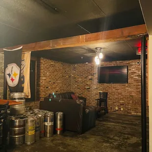 a basement with beer kegs