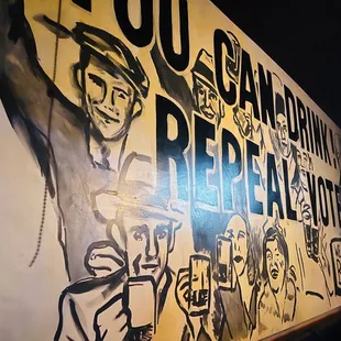 a mural on the wall of a bar