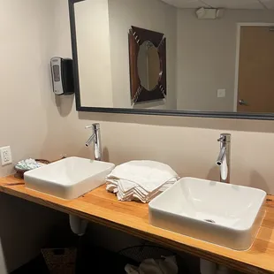 Environmentally friendly bathroom that uses real towels instead of paper.