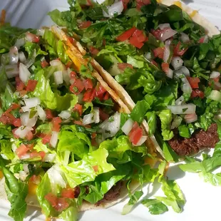 Vegetarian tacos with seitan. Can't go wrong for $3!