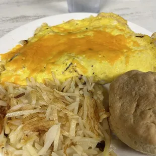 Veggie omelette with hashbrowns and biscuit. Not pictured is the honey chicken biscuit.