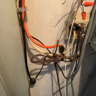 Electrical extension cords and open wire splices are a dangerous mix. We were able to clean this elctrical hazard up for our customer.