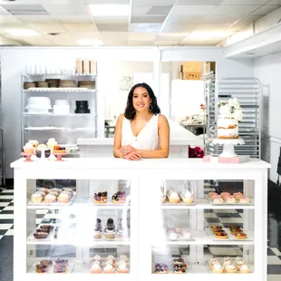 a woman behind the counter