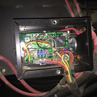 Missing cover on an electrical panel that is exposed to water and dust on the bottom of the rig.