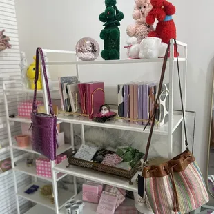 Journals, purses, poodle wine bottle covers
