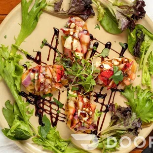 a plate of food on a wooden table