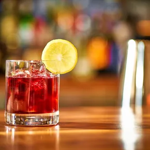 a drink with a slice of lemon