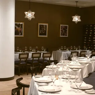 a dining room with tables and chairs