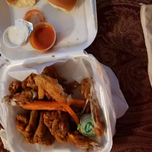 a meal in a styrofoam container
